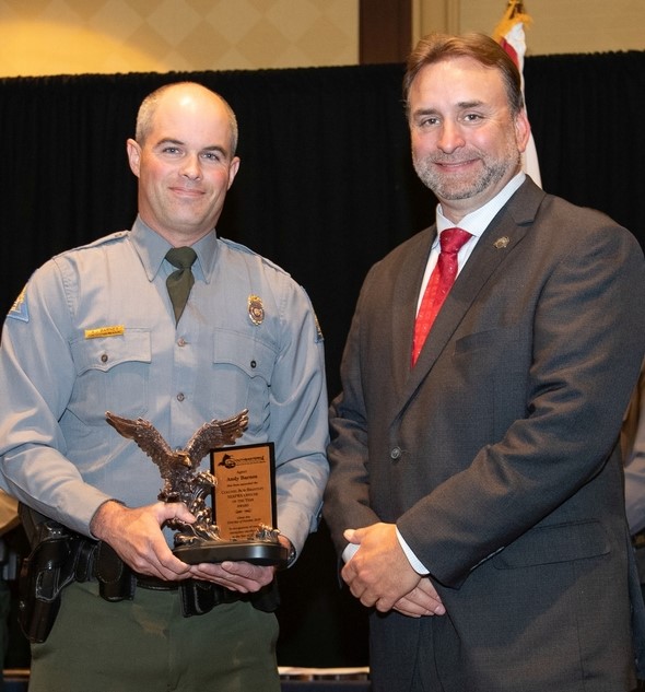 Lawrence County Conservation Agent Andy Barnes receiving award.