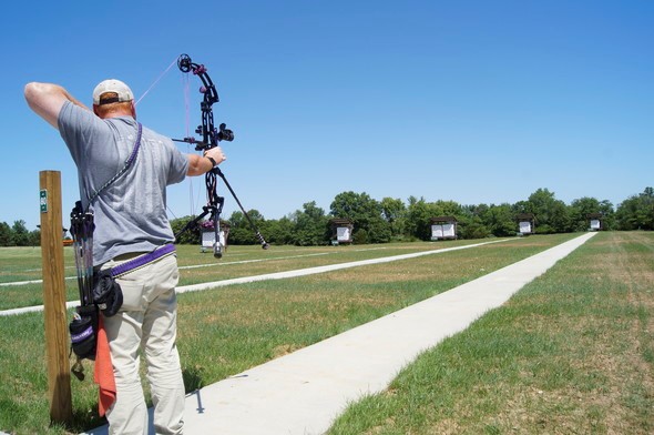 A man shoots archery at Frank Russell Recreation Area.