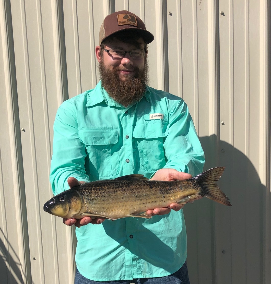 John Garver holds his state record spotted sucker