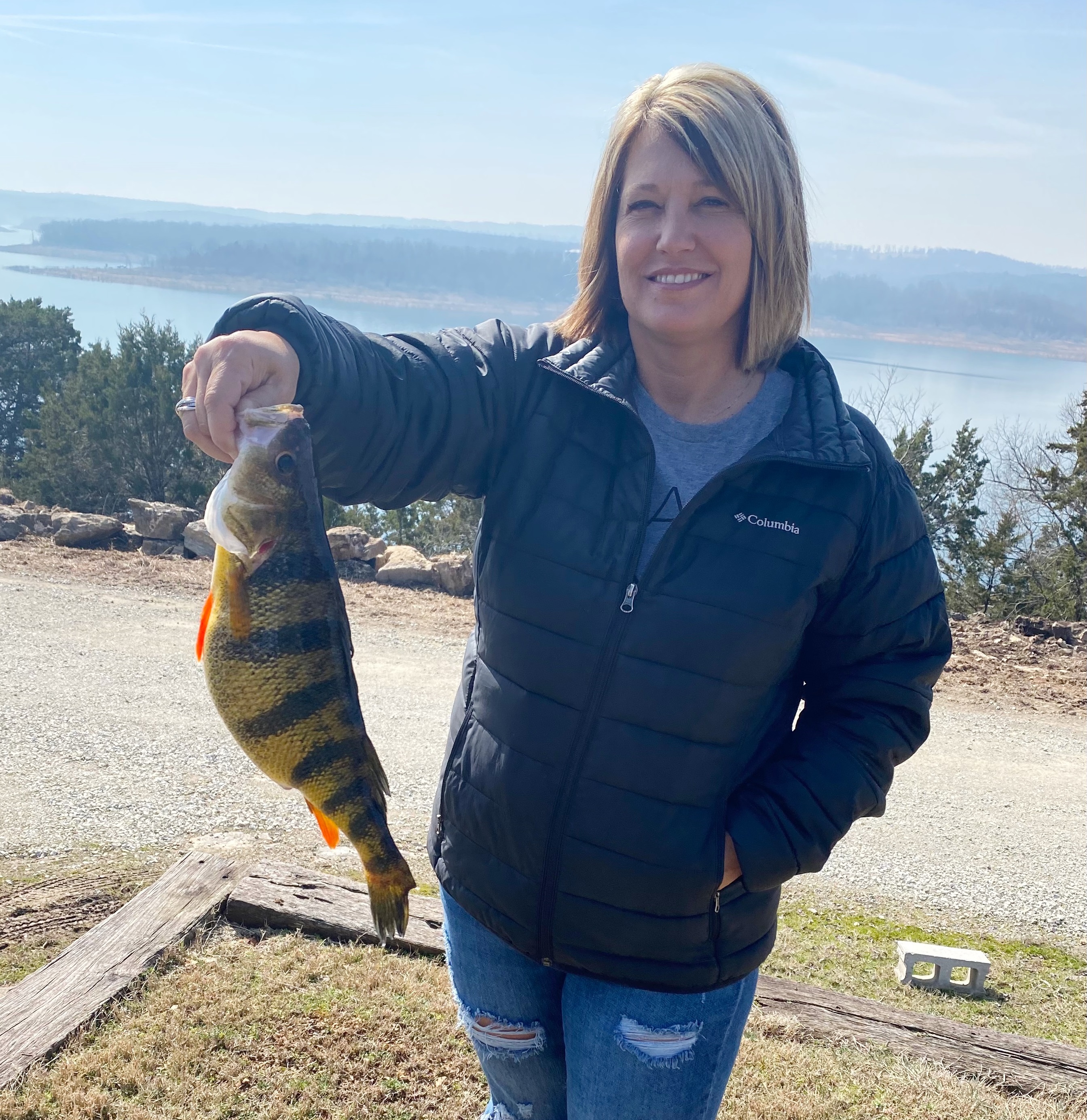 Sharon Christopher holds her state-record yellow perch.