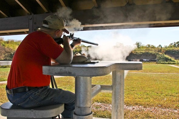 man shooting muzzleloader at Parma Woods Shooting Range