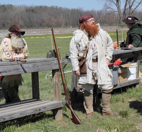 men at history-themed event