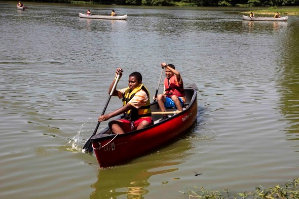 two boys in canoe