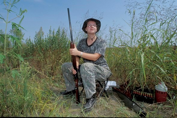 youth dove hunting in field