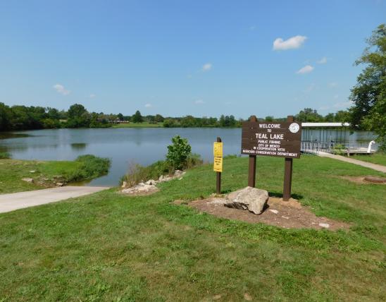 Teal Lake, Mexico, Missouri, showing boat ramp, area sign, and fishing dock
