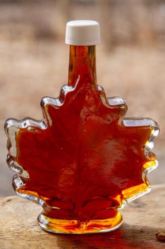 Syrup in maple leaf jar
