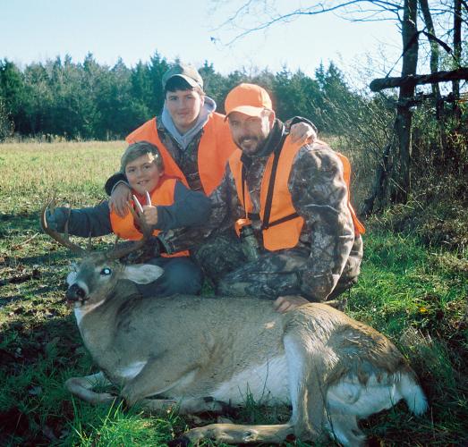Photo of a family deer hunting