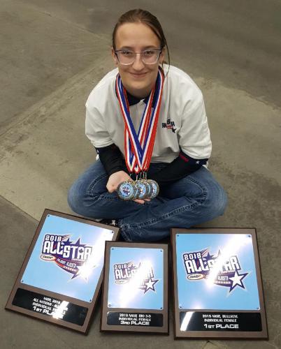 Ally Nordell with her awards from the NASP All-Star Championship Tournament.