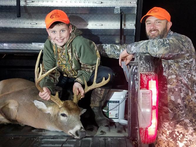 Chase Bailey and dad with harvested buck