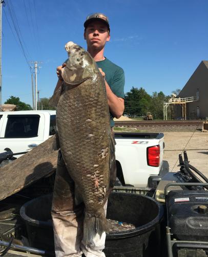 Joshua Lee poses with his 76-pound black buffalo shot April 21 at Duck Creek Conservation Area Pool 1.