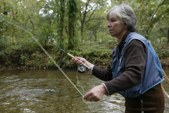 woman trout fishing