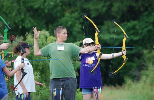 Youth practice archery