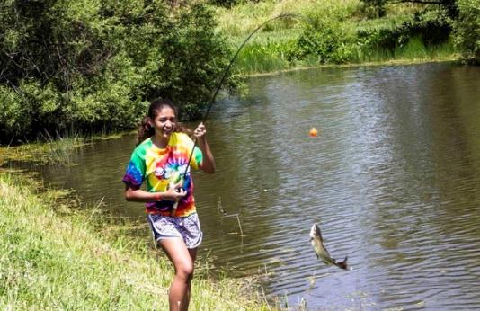Teen catches fish