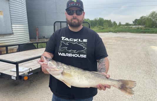Tim Stillings holds state record walleye