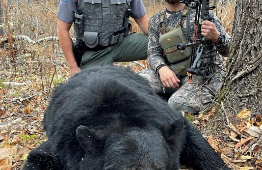 Chase Boggs with bear
