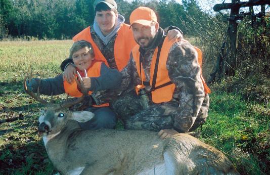 Photo of a family deer hunting