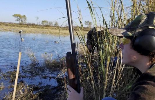 Youth boy duck hunting.