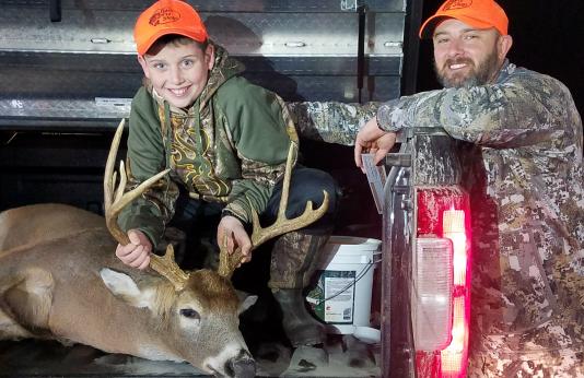 Chase Bailey and dad with harvested buck