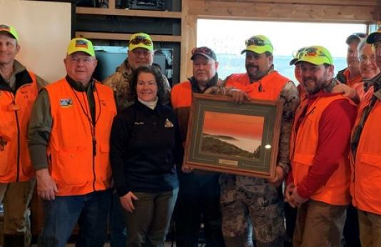MDC staff presents Duckhorn Outdoors Adventures with the Outreach and Education Partnership Award.