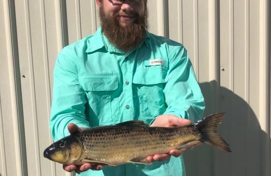 John Garver holds his state record spotted sucker