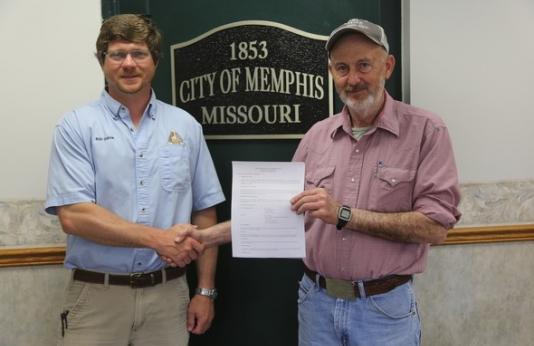 MDC Outdoor Skills Specialist Rob Garver (left), and Memphis City Superintendent Roy Monroe 