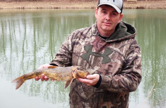 Richard Bradshaw holding his new state-record fish.