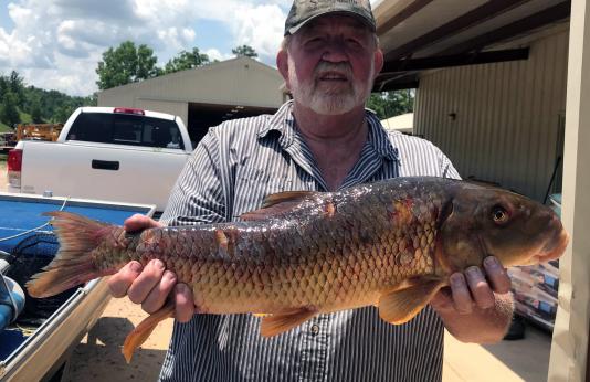 Rick Sartin holding his state-record silver redhorse.