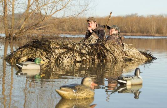 Duck hunters calling in ducks.