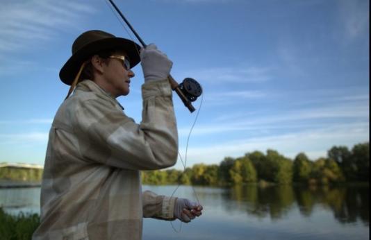 person fly fishing