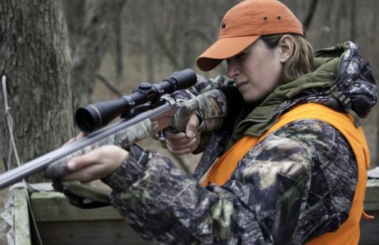 woman shooting rifle